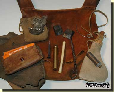 The contents of the shooting pouch displayed.