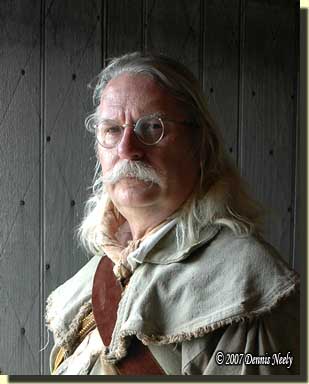 The "historical me" standing in a doorway at Fort Michilimackinac.