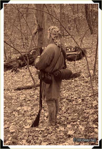 Traditional woodsman Jon Hollenbeck paused to take in the beauty of the forest during an October squirrel hunt. New France, 1753.