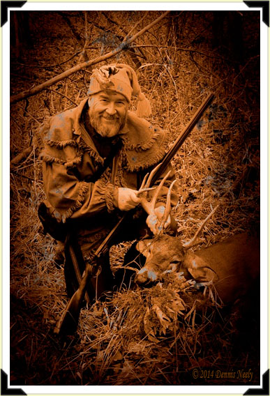 A traditional woodsman with a fine buck.