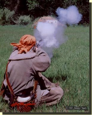 A traditional woodsman shooting from the sitting position.