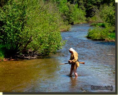 A traditional woodsman mid-stream in the Pigeon River near Vanderbilt, Michigan.