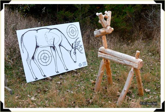A cedar-twig deer looking at a cardboard deer target.