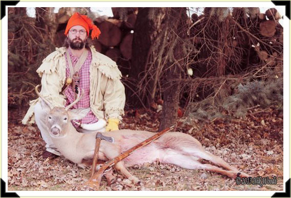 Traditional hunter Nik Woods with a fine 5-point buck.