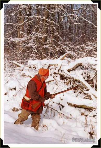 An 18th-century woodsman approaching a snowy brush pile