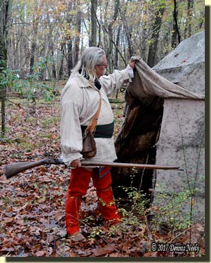 French fusil in hand, Mi-ki-naak pulls the wigwam flap down and heads into the forest of 1763.